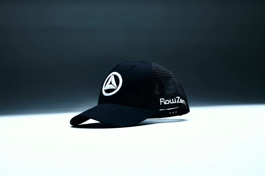 FlowZen trucker snapback cap, front three-quarter view